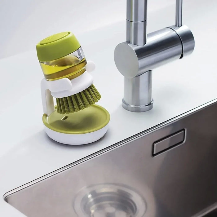 Brush with dispenser for dishes