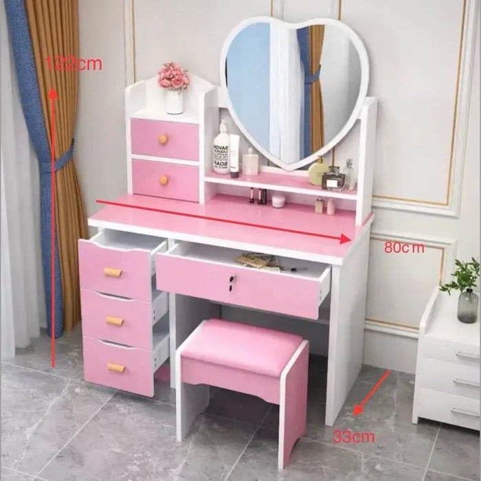 Toeletta rosa con specchio a cuore, 6 cassetti e sgabello, misure 80x33x122 cm